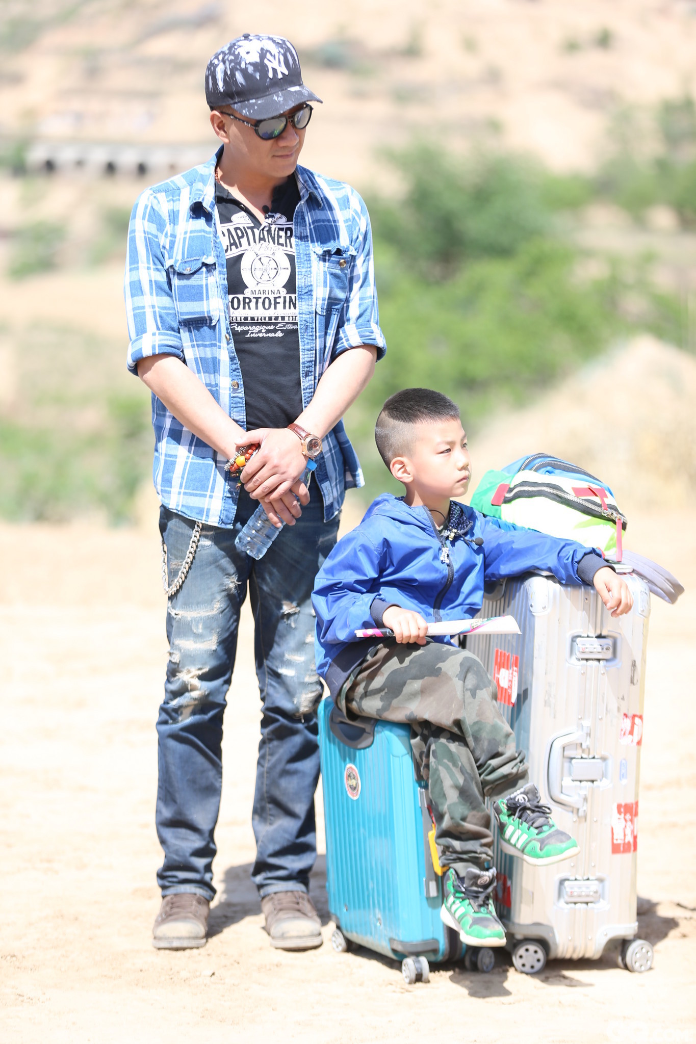 然而，2015年，胡军和儿子胡皓康参加真人秀节目《爸爸去哪儿3》后，硬汉的形象有了180度的大转变，成为了一个可爱的超级奶爸，默默站在儿子旁边的小跟班儿。