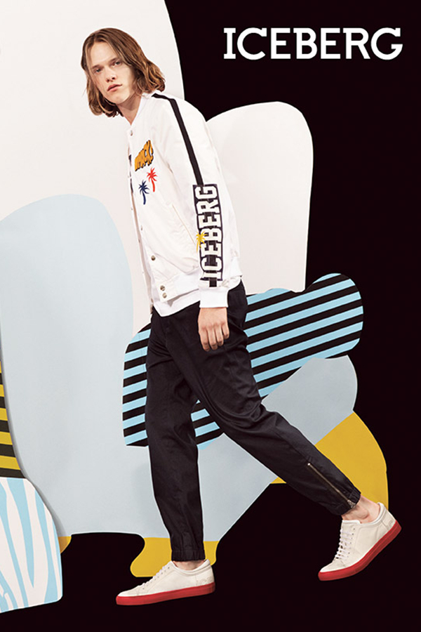 拥有迷人长发的男模Ryan Keating为Iceberg带来了大胆张扬的春季服装，宽大的剪裁延续到了2016的流行，碎裂纹的白衬衫与黑色休闲运动裤的混搭，演绎着街头嘻哈风。独特风格的服装搭配明亮色彩的不规则几何背景，飞扬着年轻的个性。